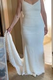I was skeptical of ordering a wedding dress off the internet but I figured why not take the risk and see. This dress was going to be my backup but instead, it is going to be my dress for my wedding. It's actually very beautiful for the cost and it fit my curves like a glove. Was scared that the large wouldn't fit me. The XL was out of stock but by surprise, the L fit perfectly. I also purchased a rhinestone belt which I think is going to complete it! I can't wait! Just be aware the material is a little see-through so yes I need to wear different undergarments but a lot of fitted dresses are like this even at David's bridal. - Rebecca T.