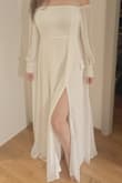 I am so happy to have decided to buy this dress for my upcoming wedding. It fits great, I like especially the part for breasts. Falling down, long enough even to be able to wear Converse. Dress came without any damage (delivered to Europe) and even with a bag to store it in the closet without dust. Can't wait to wear it! - Mirka I.