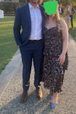 Wore this to an outdoor spring wedding [in] 2023! I ordered both a L & XL, but kept the XL. I would size up if you're between sizes or have a larger just, as the top can be a bit odd fitting if you have a bigger chest! Giving 4 stars as I did see the same issues with fabric on the top others have noted, but having the dark color and floral pattern helps to hide it, and safety pins inside can help it lay less oddly if you care to adjust that! 
Overall the dress fit great - definitely needed a bra, but Super flattering and comfortable for wearing to a spring wedding - Murielle E.