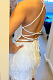 This two piece fit like a glove. It will be perfect for my bachelorette party and going out. The skirt fits well and the top is very adjustable. - Nina L.