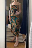 The Favorite Icon Green Floral Satin Cowl Neck Slip Midi Dress is perfect! Ordered a size small, which is my usual size from Lulus, and it fits perfectly, exactly as shown in model photos. Not super fitted and is fully lined so is very comfortable and appears nice quality. Shown wearing 1.5" heels. - Suzanna H.