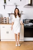 The dress fit very well and it is very cute. Perfect for work. - Tory U.