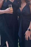 I wish I could tell you I love this dress but I was left disappointed. Too pricey for me to have to do what I did. This dress wasn't long enough to cover the front or back for me so I had to use pins to take the front cute draped part and make it go around my waist to make it appear longer. Lulus could do a better job at advertising for tall girls or even offering tall girl options. 

Perfect on short girls! It's a cute dress. Just left me disappointed and didn't work for me. We are wearing the same dress in the photo and you can see how it makes me look frumpy :( - Cheyenne B.