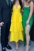 Dress was great. The vibrant yellow, ruffles, and tie back make for a beautiful design. I am 5' 4 and removed one tier of ruffles to make it the perfect midi length for me. Since I have a smaller chest the top was loose and I ended up safety pinning it. - Sophia K.