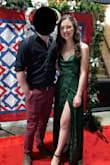 This dress is stunning! I wore it for the opening night gala at a theatre and it was perfect. The fabric, the color, and the way it drapes make it super flattering and elegant. It was a little long on me, even with heels, but I just made sure to lift it whenever I had to walk. I also used a bit of double-sided tape to keep the neckline in place, but that's to be expected with cowl neck lines. - Megan L.
