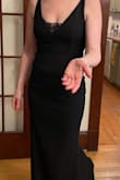 I followed the size chart and the recommended size and it fit perfectly. I love the dress, very happy with it. I was worried about the material quality, but was happy with that as well. It arrived 6 days early, which is always nice. I wanted the low neckline when I ordered but was uncomfortable with it so I popped a piece of black lace in and felt more confident. It is long for my height but I wore a 2.5'' heel which was perfect. Highly recommend just following their size chart. - Hilary A.