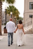 I ordered this last minute for our elopement, and it was absolutely perfect. There is a little bit of stretch to the body, so I was able to get away with a small where I might typically be a medium. It runs long and I'm very average height, and didn't have time to get to a seamstress. But with a pair of heels, it worked great and looked like the extra length was intentional. Throughout the day and evening, I had so many women commenting on how unique and beautiful the dress was. I was concerned about the see-through lace and body suit, but the lace material was perfect. It was just see-through enough to look sheer but left plenty to the imagination. I can't recommend this dress highly enough. It truly made me feel beautiful on the first day of our marriage. - Leah B.