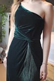I ordered this dress along with a few others because I have an event in Vegas and wanted something different. The dress is well-made, and the fringe makes it unique and elegant! I liked the length because, as a shorter person, I still wouldn't trip on the back of it. The fabric is heavy enough to make it work super well for winter events. Ultimately, the only thing that made me go with a different dress was the back. The straps looked a bit clunky. Overall, a lovely, fun option though! - Haley J.