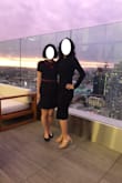 Elegant black dress that I wore to a wedding. Since I'm short, it cuts off below the knee (see photo - on the right). I felt that I needed a clear nude heel to regain the elongation of the legs. My measurements are slightly too big for a small, but I was afraid of the dress slipping off due to being backless. The material said it had stretch, but I think I could have sized up since the dress is still rather tight and I had to squeeze into it. The side zipper on the rib cage makes it easier to do that. While I wasn't constricted, I was still a bit uncomfortable. Just one of those nights where you have to watch what you eat and maintain proper posture lol. If I sized up, however, I would have needed the sleeves tailored. The arm length of the Small is already longer than my short limbs and bunches up a tiny bit. As others have mentioned, I like the structure inside the dress that holds up the V-shape. Just be sure to put the dress on gently so you don't damage it. - Alice Y.