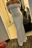 I absolutely loved this dress. It fit and hugged every inch of my body perfectly. I had to wear shapewear the day of the wedding because my stomach would definitely show in this dress. But it made my shape look amazing. I bought 6 dresses and decided on this one. The first one came with a stain on it, but I exchanged it for the new one and it came within 2 days. Loved the service. The dress is really long; I had to get it hemmed and the train shortened a bit. I could have got it even shorter but didn't have enough time, as the original alterations took a week. But this dress checked every box. This was my wedding day and reception dress all in one. Everyone complimented me. I felt so beautiful - Tanaesha L.