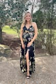 I bought this dress to wear to a wedding. I am 5 months pregnant so I wanted something flowy over my belly. This dress did not disappoint! I got so many compliments on it. I usually wear a medium when I'm not pregnant, but I did need a size large with my baby bump (I'm currently 155 lbs while pregnant). - Charlotte W.
