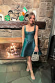 Absolutely loved this dress! The corset part has no stretch whatsoever and did get a little uncomfortable, especially after eating but I didn't even care. This was such a fun dress to wear and I got so many compliments. I just had to make sure I ironed it really well so the hips didn't look wrinkled and awkward. - Meg K.