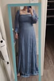 This dress is beautiful but it just didn't suit my body. My breasts look even larger than they are in it and the sleeves are farther out on the shoulder than expected. Other than that the dress is beautiful and would look lovely on someone that has smaller breasts. - Holly Y.