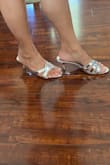 I love the way it fits and looks. The style is this pretty silver shiny metallic color with a nice low heel. It's slightly 1/2 an inch big but no problem as long as it's comfortable to walk in. I love them. Thank you, LULUS! - Ernestine D.