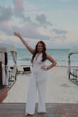 I wore this for a work event, and I love it!! It fits perfectly and is so flattering!! I need one in every color!! Saving this for future vacations and bridal showers!! - Niekole H.