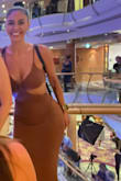 This dress highlights all the right curves. The material is soft and delicate but doesn't feel cheap. I purchased this before I had a breast lift (w/ small implants). I only mention them being small bc so much of my chichis are still natural skin; they don't sit as steadily or high as a larger implant would. They move a lot like a natural bust, and this definitely changes how clothes fit. An XS fits a 34B and totally natural chichis that didn't love to cooperate, even if I made the straps as short as possible (still comfortable). Now, I opt for clothing tape bc without it, the cleavage is a bit much for me, but changing sizes wouldn't help that. I wear size 26 and 27 Levis and an XS in most Lulus clothing. - Roxanne E.