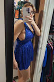 The romper is beautiful, but the chest area it's super open everywhere where wearing a Brad doesn't look good. I have to find me a blue Brad maybe that will work thatch the color not sure it's also super short! My boobs are literally out from the side of the dress. Other than that, the dress is gorgeous. - Susana C.
