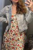 I got the dress when it was on sale for a cute summer/spring dress. I love it so much it's so beautiful!! It has a slit on each side that allows it to flow in the wind. The arm bands were a little tight on me but I am more muscular so sometimes a small fits perfect, and sometimes it doesn't. It wasn't a big deal enough for me to go up a size as it fit perfect everywhere else. 10/10 recommend! - Candace J.
