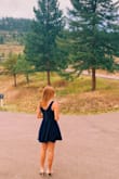 I wear this dress all the time but initially bought for a fall wedding. Great material and super comfortable. It flatters your waist but is still comfortable. - Katie Q.