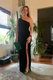 My daughter talked me into buying green stiletto shoes and I wanted a unique black dress to go with it.  This dress is perfect.  It is unique with the one shoulder, small cutout, and high slit.  I am fit and in my 50's and this dress fits perfectly.  I have a slight pouch in my stomach and this dress looks great!  I also bought the beaded clutch purse and it brings it all together! - Keri B.