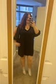 I had a lot of fun wearing this dress! Only giving it 4 stars because I feel like the sizing could be a little better. It was super cute and easy to dress up for the concert I wore it to. As someone with a 34H bra size and a comparatively smaller waist, I don't often wear things without clear waist definition, but I still felt cute and fun and not like I was a box. The lining material is soft and stretches a bit, while the outer fabric does not stretch, so something to be aware of. Based on my measurements, I was recommended the size 1X but decided to go with the XL given a couple comments about preferring the fit a size down. Definitely glad I did! I think it was the right call and helped give a bit of shape even though the dress was still very loose and swingy. Not sure if folks considering smaller sizes would feel the same way, but for me the 1X probably would have felt very boxy where the XL worked nicely. It's a solid LBD, has some interest without being too boxed into one style. - Taylor D.