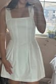 I love the design of this dress, and the pearls are so beautiful in person! I ordered for my college graduation but, unfortunately, will probably be returning since the straps are a bit too long (they fall off the shoulder easily) and the dress is fairly see through. The double lining definitely helps, but I found that the seams in the lining don't match up with the outer layer, and you can tell when it's on- I tried to get them to match as best as I could in the photo, but I'm sure, with standing and sitting, it would shift around all day. It might have been better to sew the lining to the outer layer rather than having two separate pieces. I do love the dress though, and if you don't mind the mismatch seams, then this would be a great dress. - Elizabeth H.
