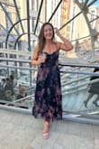 The dress delivered quickly and fit perfectly. TTS. It was a bit longer than I expected but still worked well. My only complaint are the straps. They do not stay up. I had to get them adjusted all night to stay in place. I still love the dress though; the color is beautiful. - Shelly P.