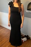 This was the best dress I have EVER bought!! The quality of material and the stretchy fabric hit in all the right places! I received so many compliments!!! - Holly W.