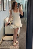 I absolutely LOVE this dress! I bought it for my bridal showers coming up and it fits perfectly and is very forgiving in the waist area due to the fabric/material it's made of. I was nervous it would be tight around my stomach but I got a size small and it looks so good and is super comfortable and cute! Very happy with my purchase :) - Madison K.