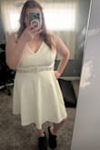 Much like the other dresses on here, you should look at the measurements and not the 'size'. That helped me immensely. I am normally an XL or 1x, and the 3x fits me perfectly. This is extremely nice quality fabric - it is thick and crisp white and beautiful! I wanted to have a shorter more casual dress for my courthouse adventure, and picked this one up. I am pairing it with a gauzy white bow, custom light blue converse, and I have a bridal belt to pair with it. I am so excited to wear it for my courthouse day! - Katherine S.