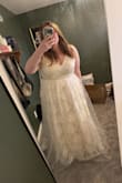 This dress is so beautiful. I wish it had looked good on me because I was envisioning this one as my pick for my elopement and photoshoot in the woods. Unfortunately, it makes me look much bigger than I am. It hits right above my waistline and poufs out to make me look 2 sizes larger. It was not for me. I think this would be gorgeous on someone who is not apple shape! You can see that I am leaning forward in my picture because even then I was trying to make up for how it made me look :( - Katherine S.