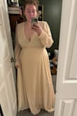 This dress is EVERYTHING I could have dreamed of. I didn't initially order it, but decided to add it on and give it a try. Holy Moly I am glad I did because it is gorgeous. The color is cream, which I loved for my elopement. The wrap dress is extremely flattering on my Apple-shaped body, and the slit is EVERYTHING. The beads on the sleeves are so beautiful, and if you look through all the photos of everyone in this dress, you will see how it literally looks good on everyone. I will need to get the sleeve cuffs taken in and do something about the chest area - either wear boob tape and do no bra, or have my tailor work some magic so my bra won't show. I recommend sizing up to accommodate for a larger chest - it gives you a more flowy look too! I ordered a 3x, normally wear a 1x, and was going to order the 2x but it was out of stock - I am so glad I got the size up! 10/10, I am so excited to wear this dress for my elopement photoshoot in the Grand Canyon and rocks of Arizona. - Katherine S.