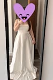 I bought this dress and it fits perfectly. It looks better than in the picture. The quality is really good. However, for my height, I need to get it tailored for my big day. - Mariana B.