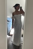 This dress is so pretty and flattering, but the top half of the fabric did not sit flat. It seemed like there was an issue when it was made because the fabric bunched up in some parts. I should have taken a close-up photo of the issue before returning but forgot :/ - Kelly B.