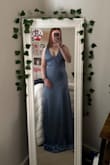 This dress fit me really well, but it was SO long omg. I'm on the shorter side but would've had to get it altered for sure. I also think that I would've been messing with the straps since it twists in the back and doesn't have a way to stay in place. - Brooke P.