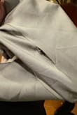 The material is very nice and the jacket fits well. It's an easy way to class up a normal outfit. My only complaint is the stitching. There are a few places where I saw loose thread and then I saw a hole in one of the seams. For the money, I'd expect more quality. - Sigal F.