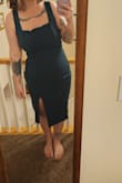 This dress hugs me in all the right places. The material is nice and stretchy. The straps and bust are a little big (even for someone with a large bust) but I think I can safety pin it. - Samantha M.