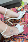 First off, BOWS and sexy!! It adds a totally different element for photo purposes.
I will be using these to take all my photos the day of and prior to the ceremony because my dress has a sexy slit up the side, perfect shoe. Then changing to something a little shorter due to it being an outdoor wedding and the path I am walking on. (I don't have a pic with the dress because my wedding is not until 4/20).
I LOVE THEM! - Justin K.