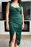 Very flattering and comfortable. I was worried I wouldn't be able to sit as it could ride up when I did, but no problem there. Excited to wear this for my friend's wedding in the fall! It needs a steam but otherwise, it is event-ready. I love the straps that are adjustable and so cute with bows. - Stephanie S.