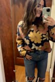 Wore this out to brunch and got so many compliments! Everyone asked where I got it and several of my friends immediately went to purchase it. It's roomy but cropped just enough to meet the top of my jeans. I purchased a Medium. - Jessica S.