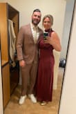 Wasn't totally sure on the style of this dress but once I put it on, I was sold. I did purchase shapewear to smooth my mid-
section as the material does show your shape. Got many compliments. - Carly T.