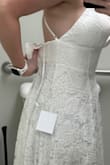 I saw multiple people saying the straps were in the long location (under armpit) and figured it was a slim chance it would be a continued issue. But I was wrong. The dress was also quite large. - Amanda G.