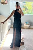 The dress was beautiful but unfortunately I decided to return it, as I did not want to pay to have it hemmed. If you're on the taller side this certainly won't be an issue, but I'm 5'3" and even with a 4 1/2 inch heel it was way too long. - Laura B.