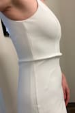 I loved the sturdiness of the fabric, but it was really poorly constructed. The straps didn't lay nicely. The outer and inner layers of the bodice were almost different sizes, which led to a really nasty crease around the waistline (pictured) that would have needed corrective surgery to make it presentable. It might lay nicer on someone with a larger bust or a different body shape, but it wasn't going to cut it for my wedding - Allison K.