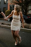 Wore for engagement photos. Felt stunning. Although, I felt like the dress really needed something; I went with a gold chain belt and was very happy. It fit well. I usually wear a M but sized up. It was very flattering but still quite tight when I sat down. Definitely size up. - Olivia D.