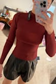 The neck/shoulder/chest area fits really uncomfortably if you have a chest. It pulled on my neck as well. Shoulders also are really loose at the top, contributing to uncomfortable fit. - Arlie M.