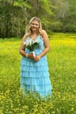 This dress is stunning on. It's the perfect hue of blue, I felt like a modern day Cinderella. I received so many compliments on this comfortable fit like a glove dress. It was long for me but I'm a little vertically challenged. The straps were adjustable so it would fit any height. Must purchase. I love it - Kasey R.