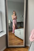 The dress fits perfectly and the material is so feminine and pretty. Perfect for wedding guest dress or spring event. Fits true to size. I ordered a small and the length is still great! - Allison S.