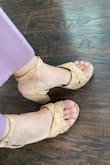 I am normally a very true size 6 and purchased 6.5 in these because length-wise, they run a little small. However, the straps are so wide! I've attached a photo. I love how cute these shoes are though, so I found thick ball-of-foot inserts to tighten and close the gap between the top of my foot and the straps. It worked. Not sure I'd recommend, but they are cute! - Larissa W.