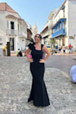 My mom (5'2, 140 lbs) bought this dress for herself, but I ended up wearing it (I'm 5'6, 165 lbs) and it was stunning. I never would've picked this for myself, but it's so flattering. I didn't need a bra which is a huge plus. Thick, quality material and it has some stretch to the fabric to make it comfortable. - Sophie P.